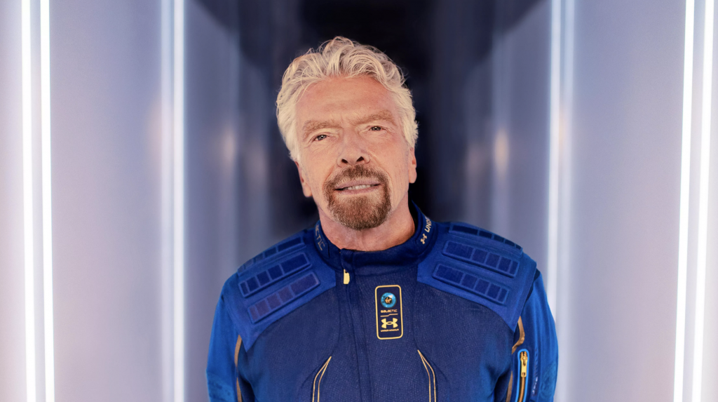A photo of Sir Richard Branson looking at the camera.